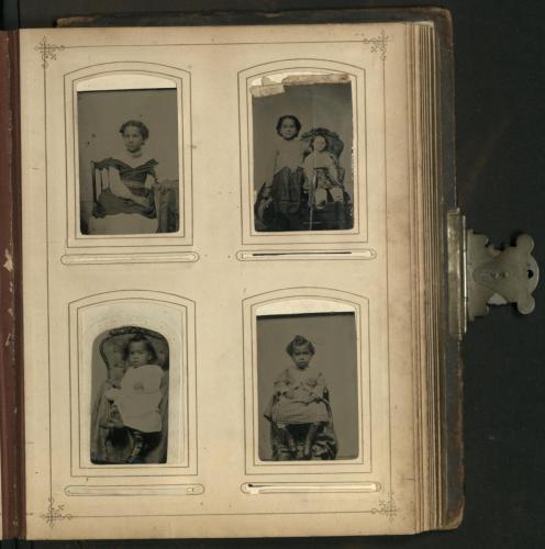 Page from Anna Alston’s photograph album with four photos three of which have John Alston written on their backs. The upper left, upper right, and lower right photographs bear the description “John Alston”